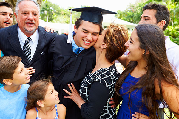 family gathered around the graduate