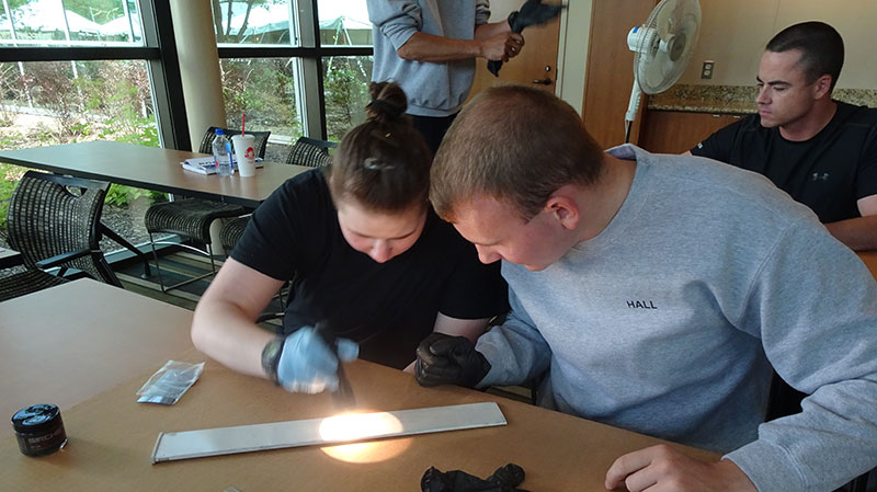 police trainees at a table