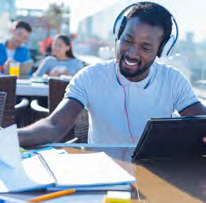 Student studying with headphones