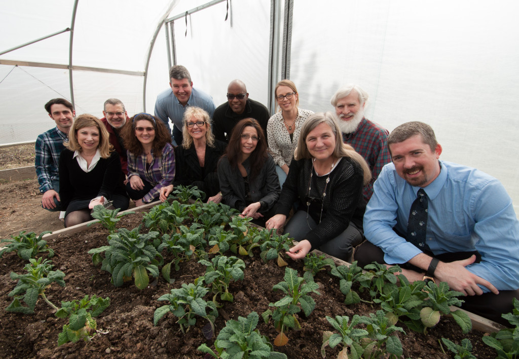 Some members of the Sustainability Council gather to welcome a spring crop of kale at the CoRE garden. Photo by Jessica Bibbee