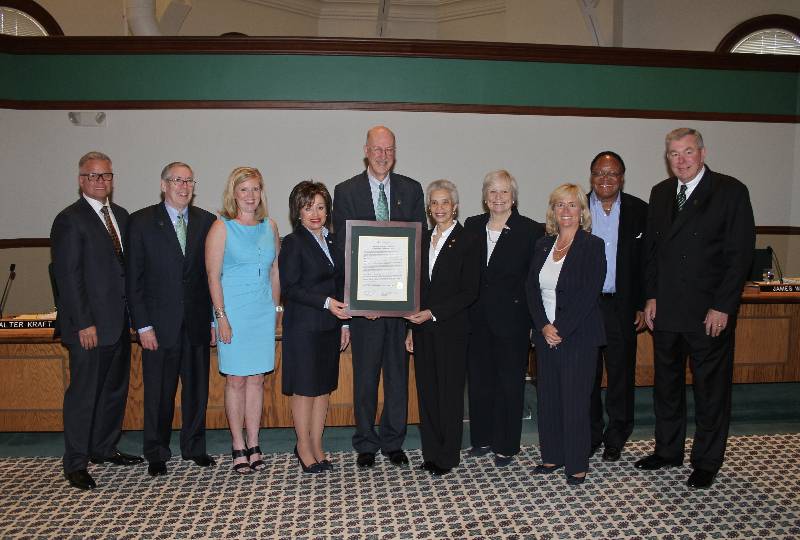 From left, EMU regents Mike Hawks, Dennis Beagen and Michelle Crumm; WCC President Dr. Rose B. Bellanca, EMU Interim President Donald Loppnow, WCC Trustee Vice Chair Diana McKnight- Morton, EMU regents Beth Fitzsimmons, Mary Treder Lang, James Stapleton and James Webb. (Photo by Lynn Monson)