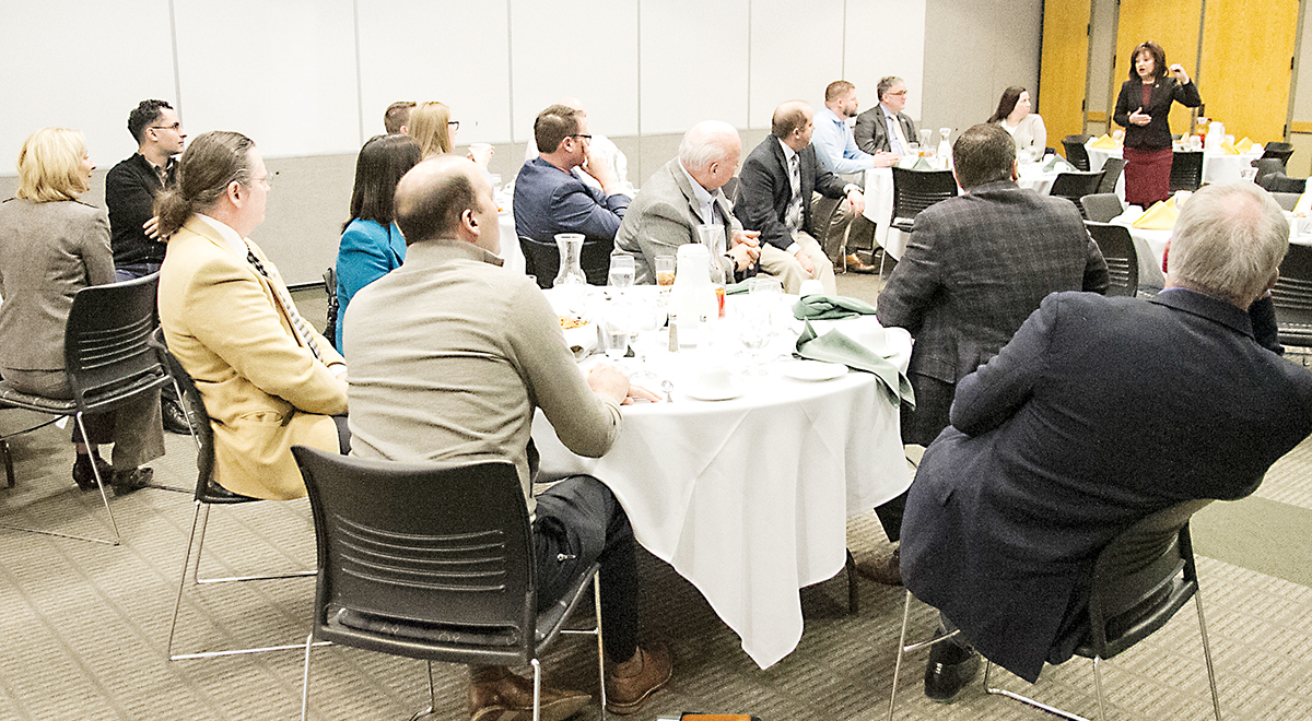 President Dr. Rose B. Bellanca (right) welcomes the Michigan Council on Future Mobility to the WCC campus. (Photo by Kelly Gampel)