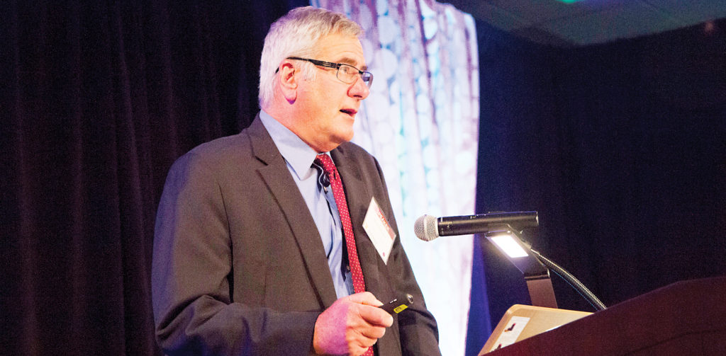 University of Michigan economist Donald Grimes shared plenty of good news about the local economy at a recent Washtenaw Economic Club luncheon. (Photo by Kelly Gampel)